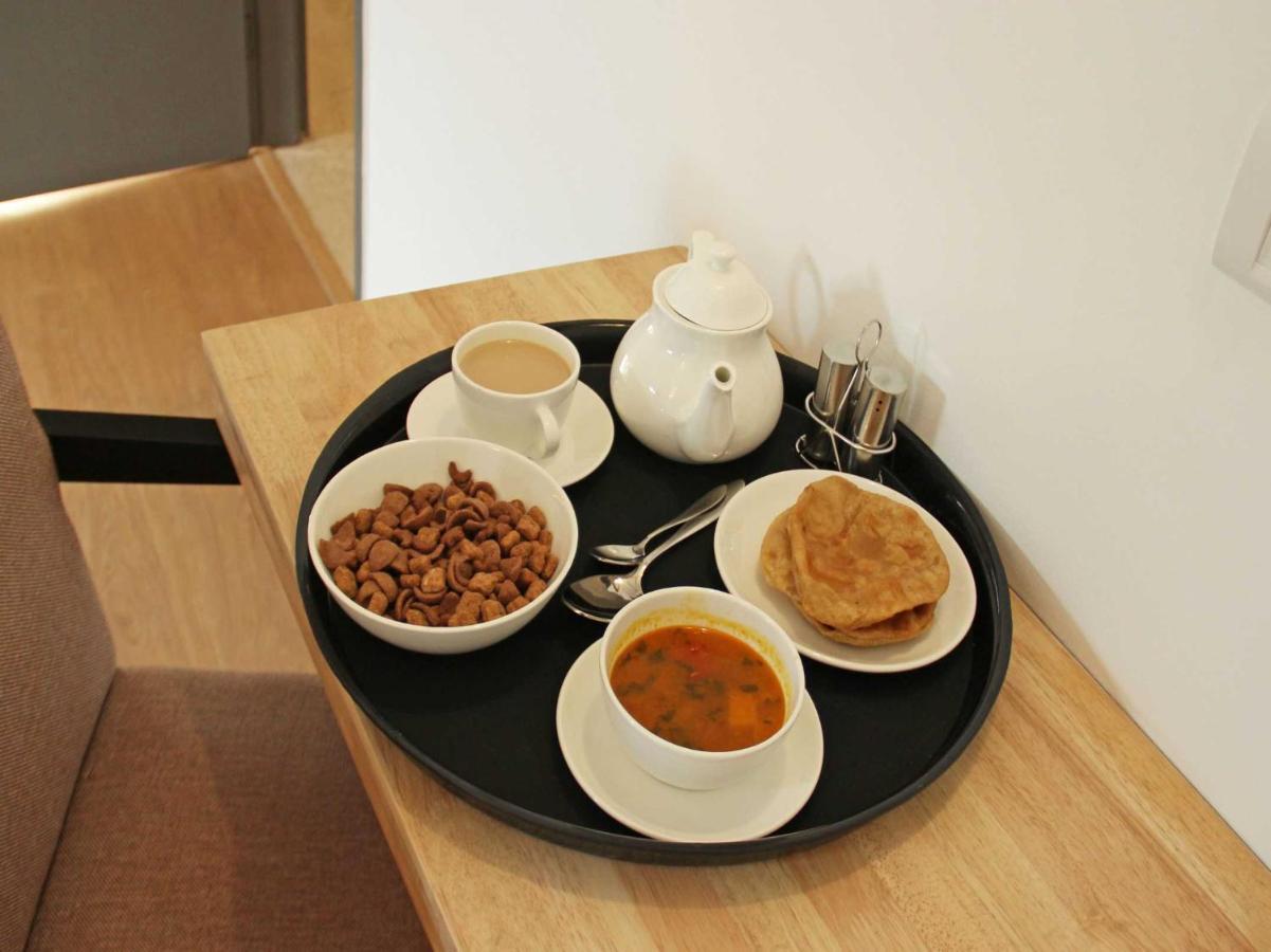 Oyo 71675 New Aishwarya Comforts Hotel Bangalore Bagian luar foto